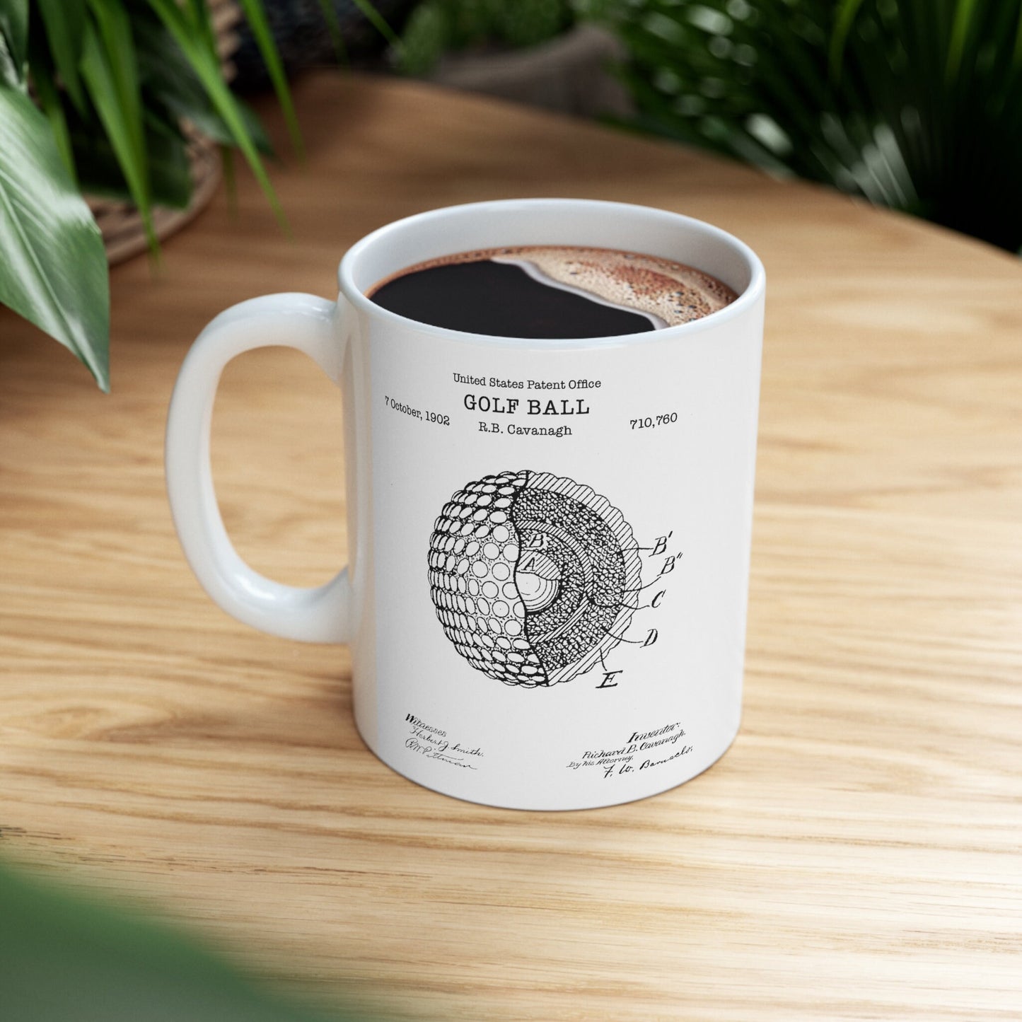 a coffee mug with a diagram of a golf ball