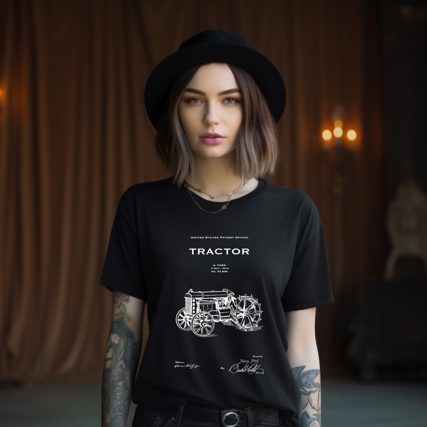 a woman wearing a black tractor t - shirt