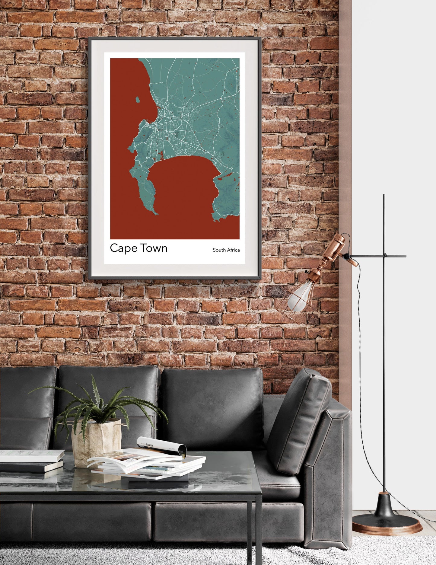 a living room with a couch and a brick wall