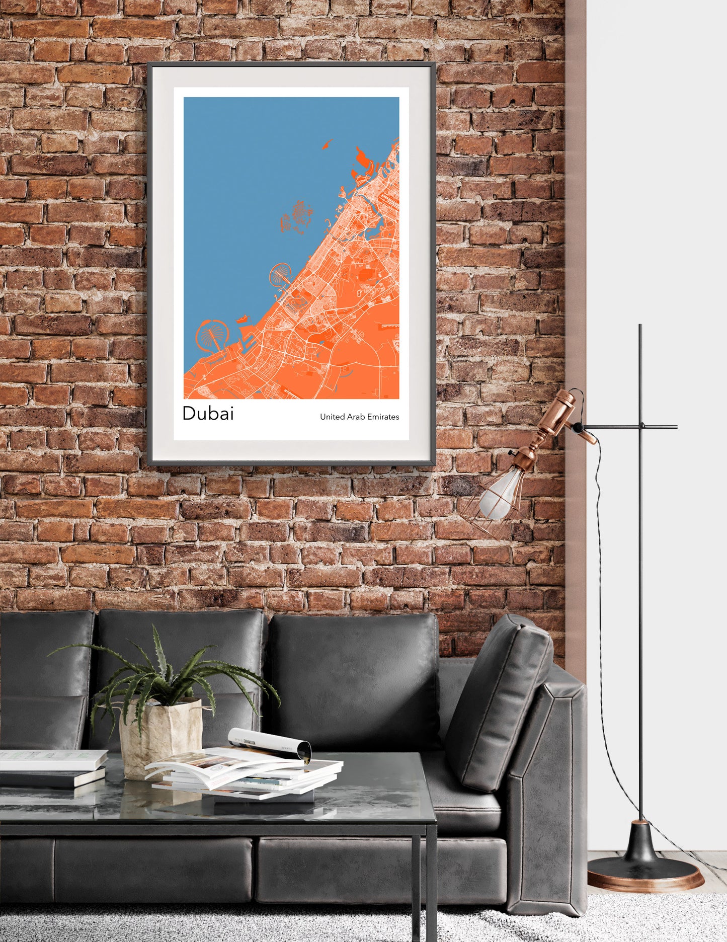 a living room with a couch and a brick wall