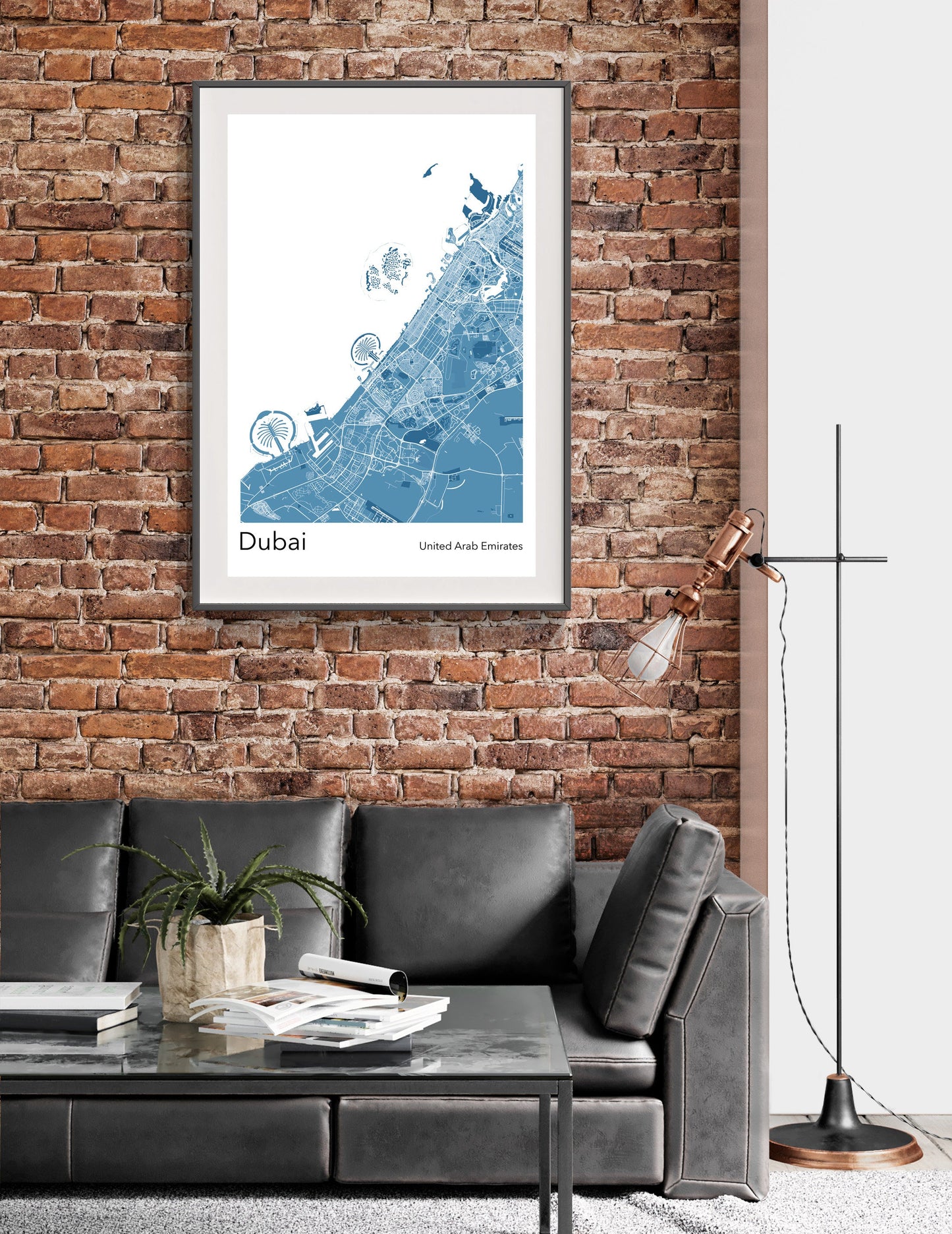 a living room with a couch and a brick wall