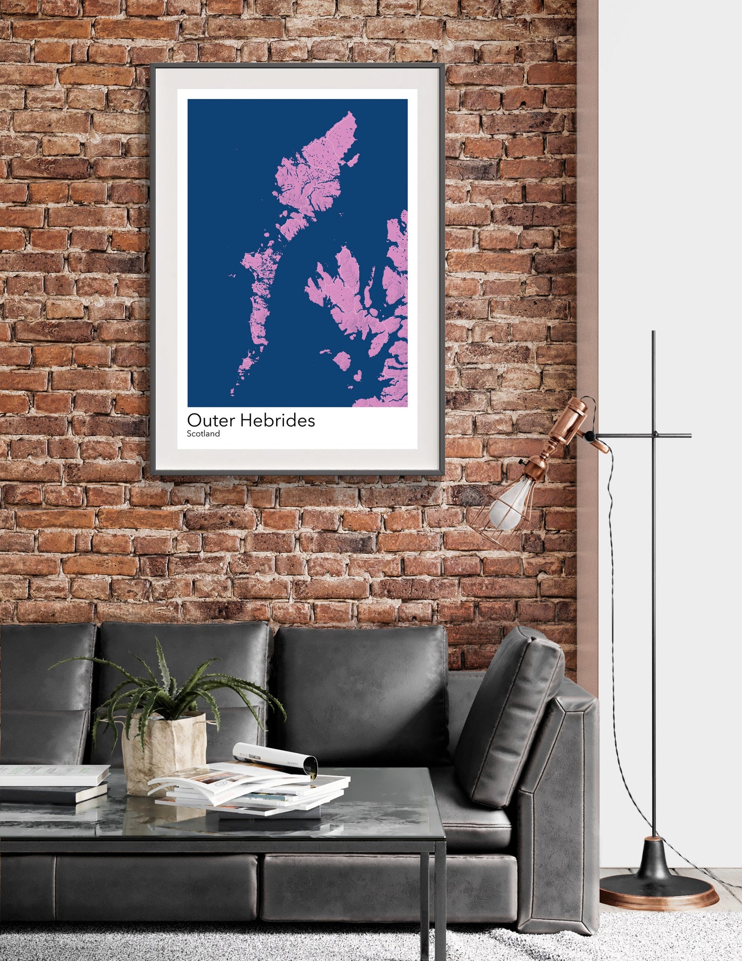 a living room with a couch and a brick wall