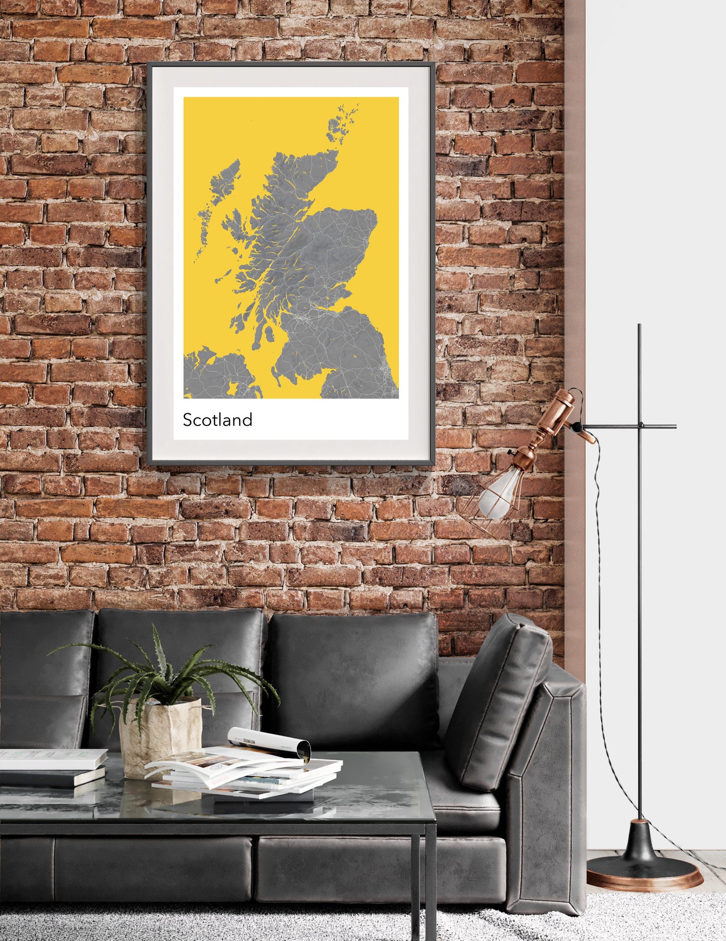 a living room with a couch and a brick wall