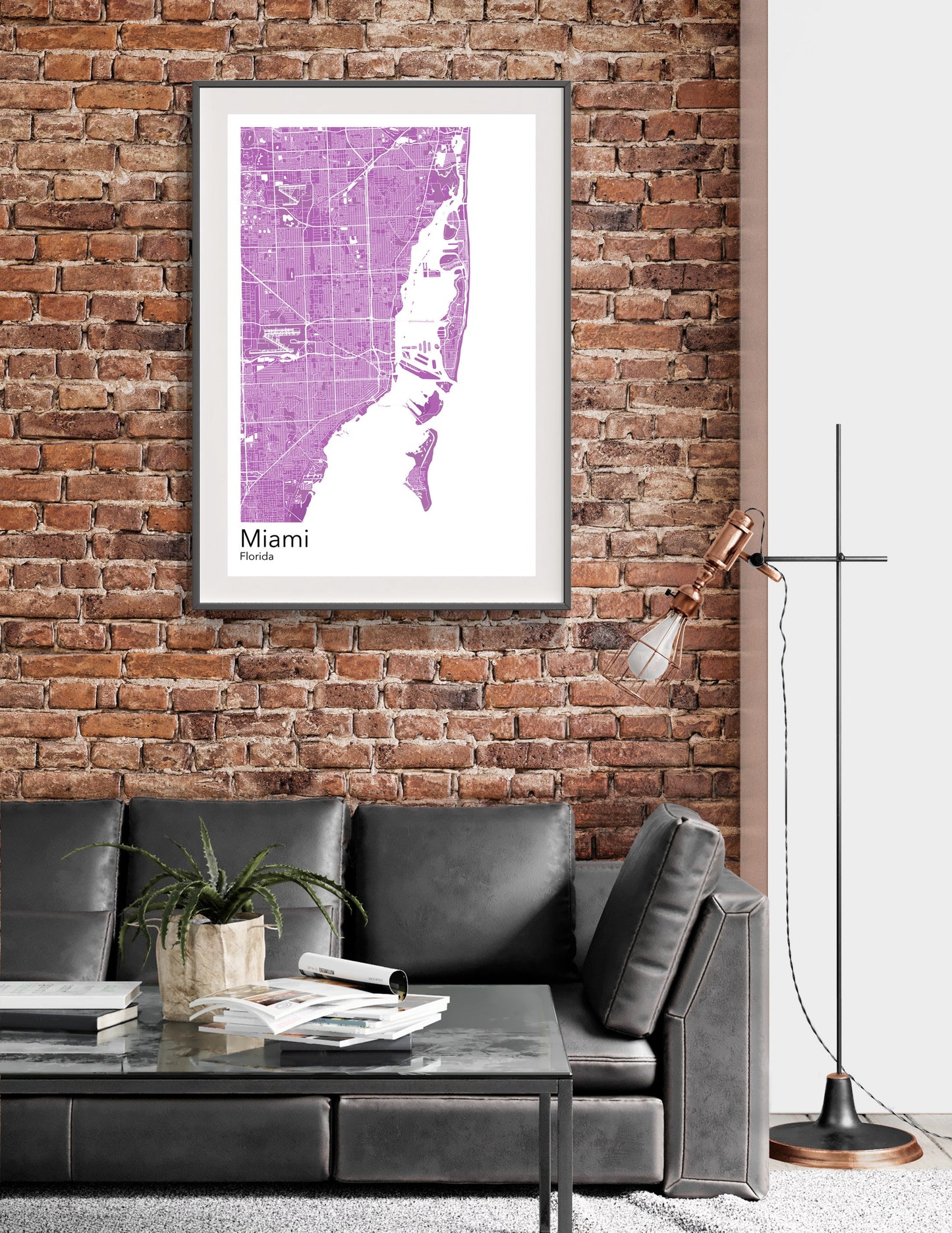 a living room with a couch and a brick wall