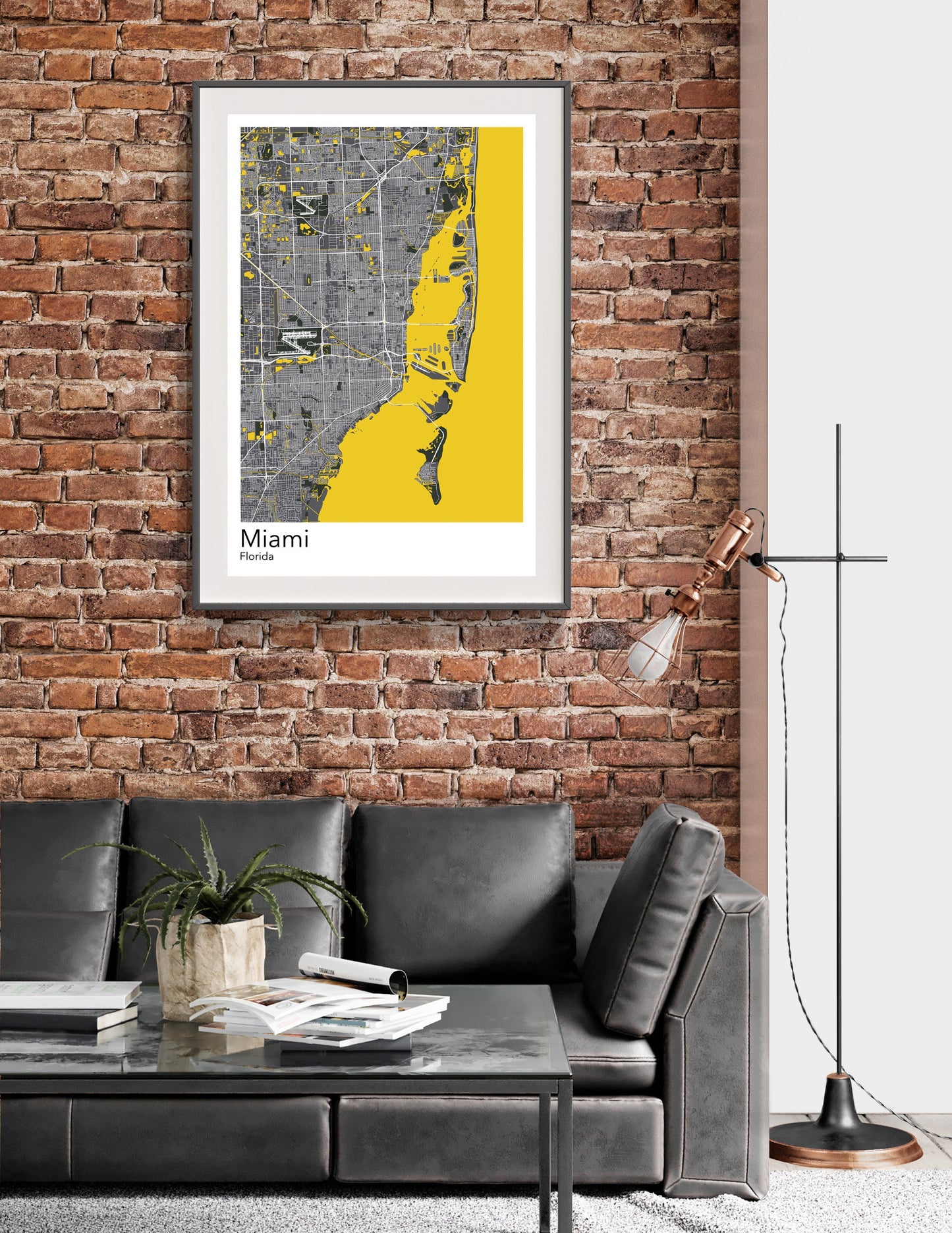 a living room with a couch and a brick wall