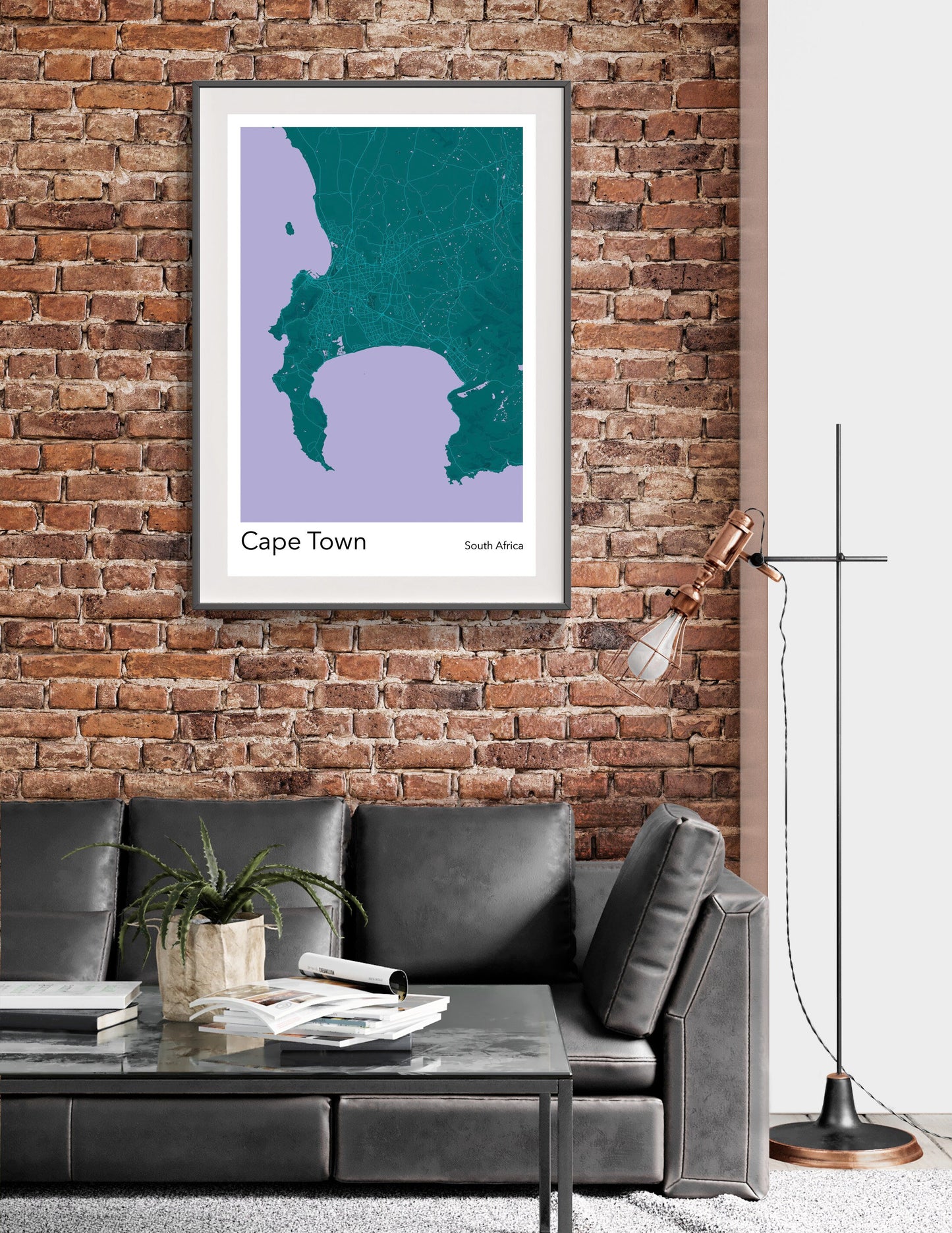 a living room with a couch and a brick wall