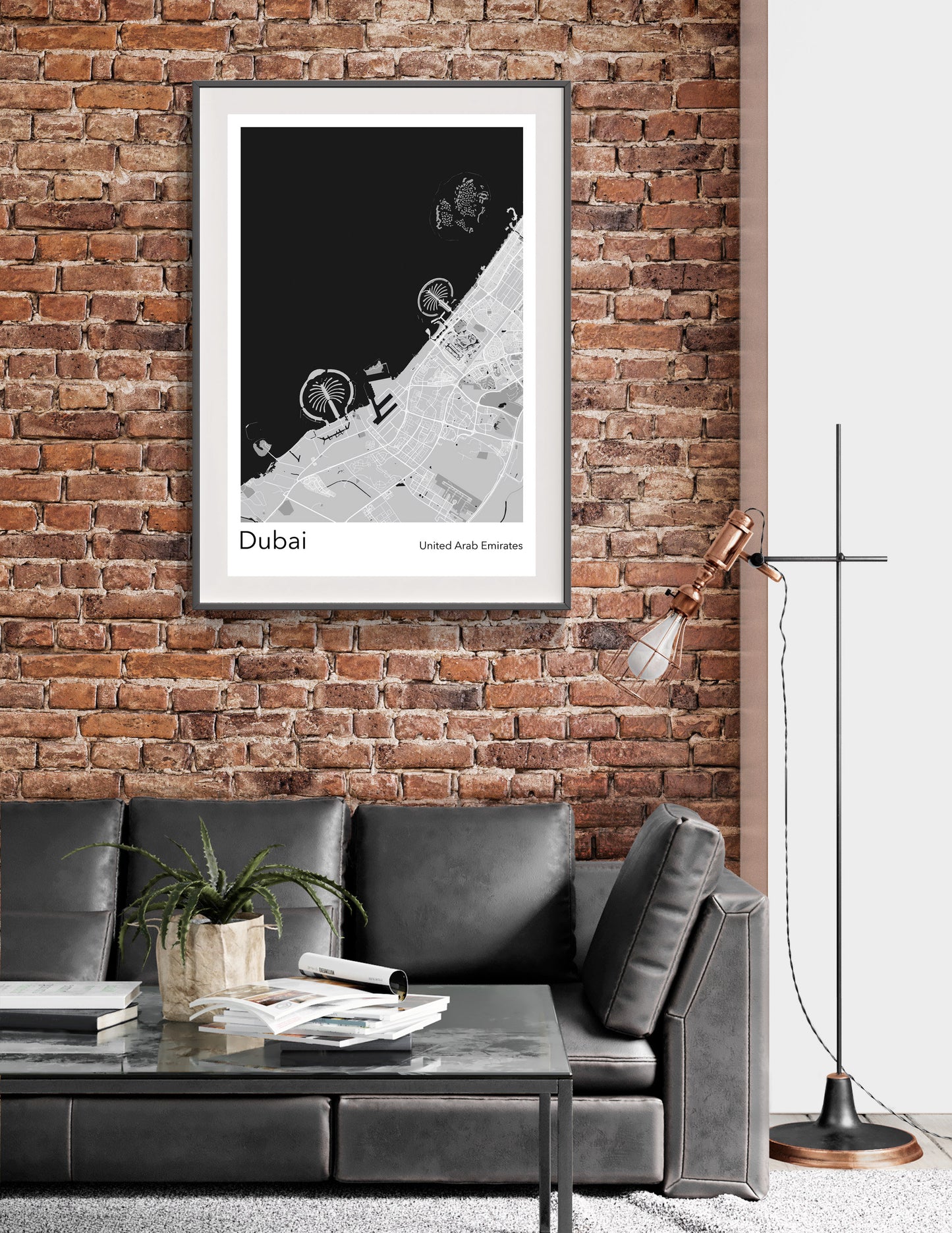 a living room with a couch and a brick wall