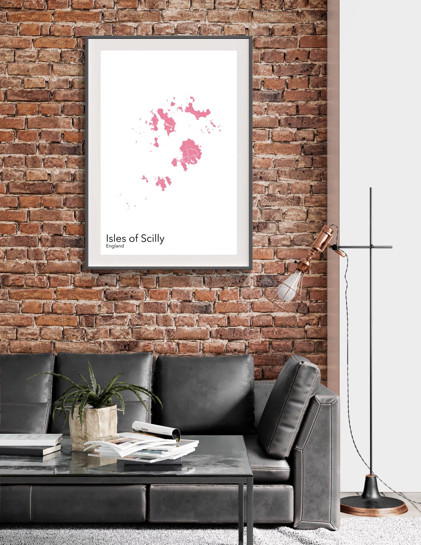 a living room with a couch and a brick wall