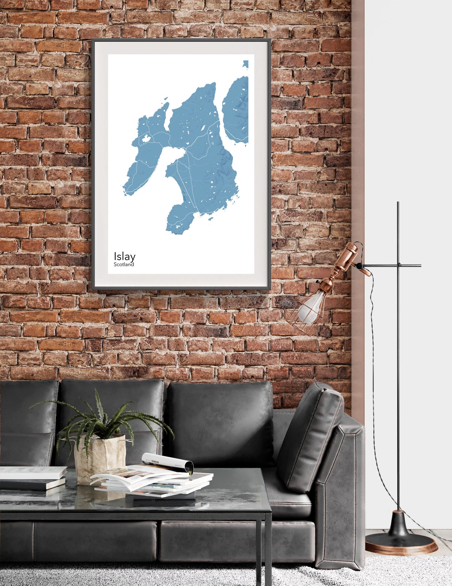 a living room with a couch and a brick wall