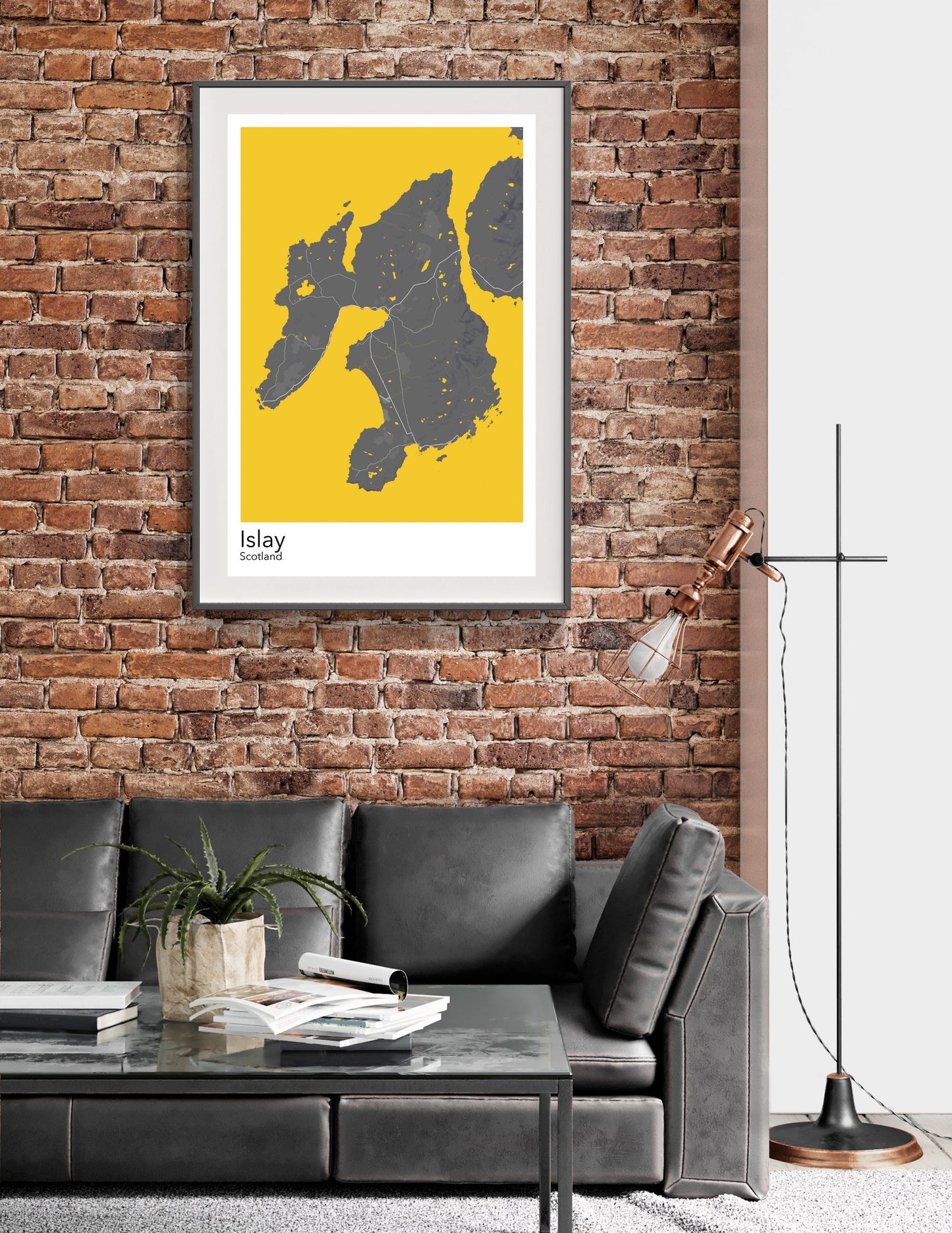 a living room with a couch and a brick wall