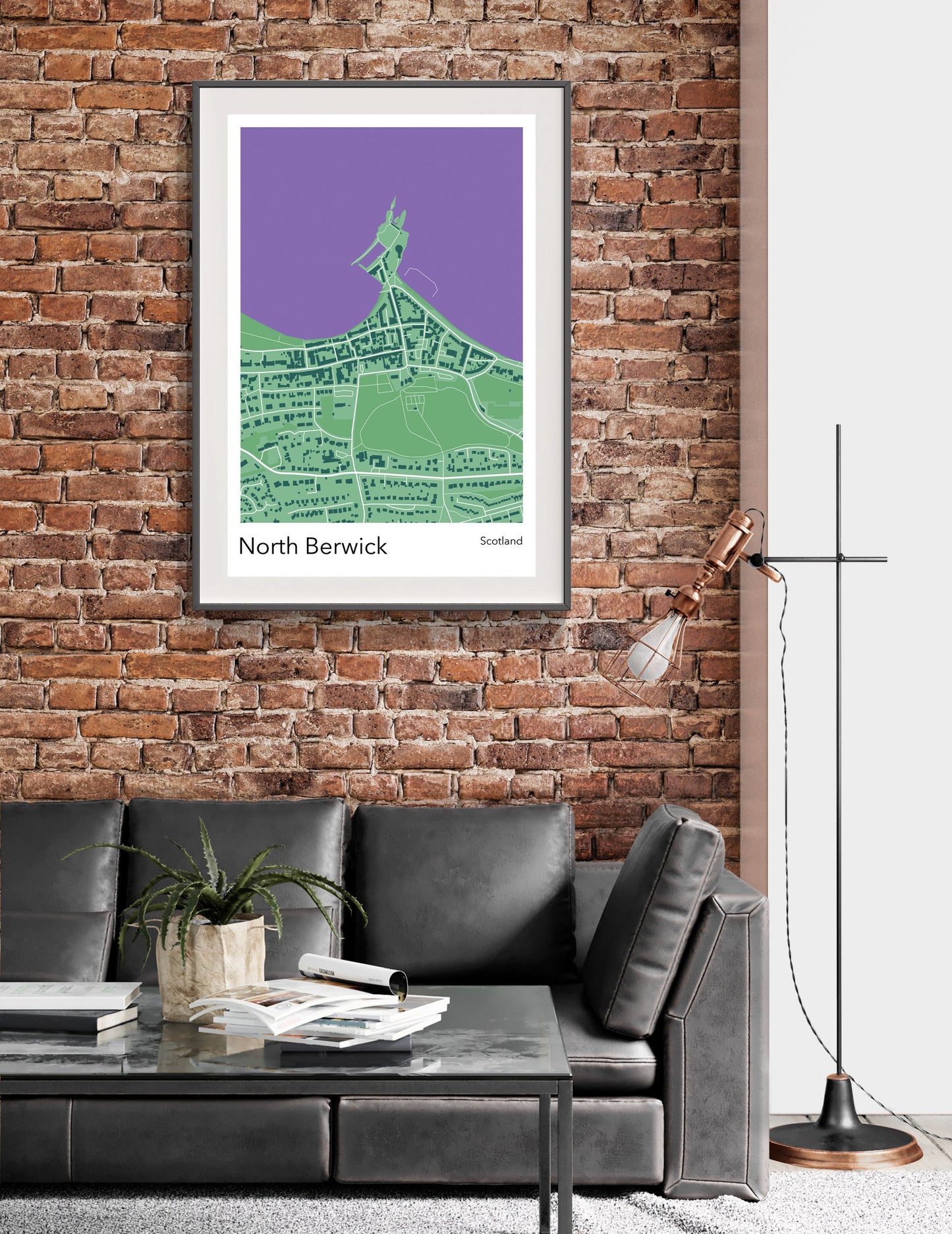 a living room with a couch and a brick wall