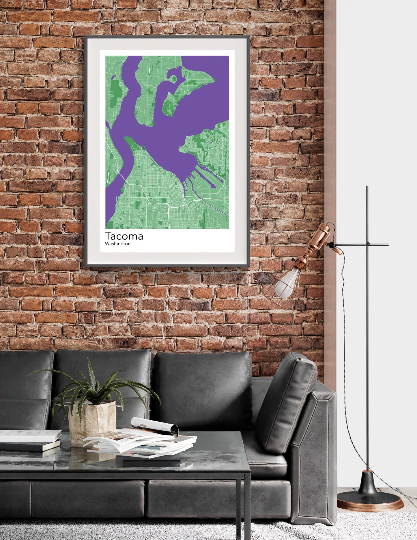 a living room with a couch and a brick wall