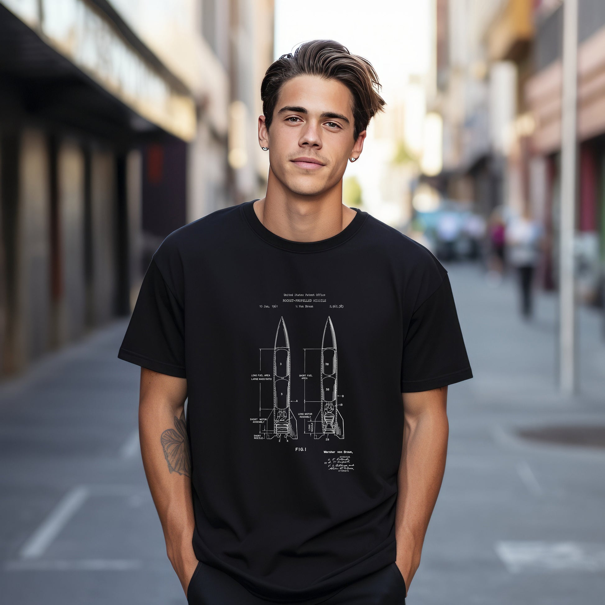 a man standing on a street with a black shirt on