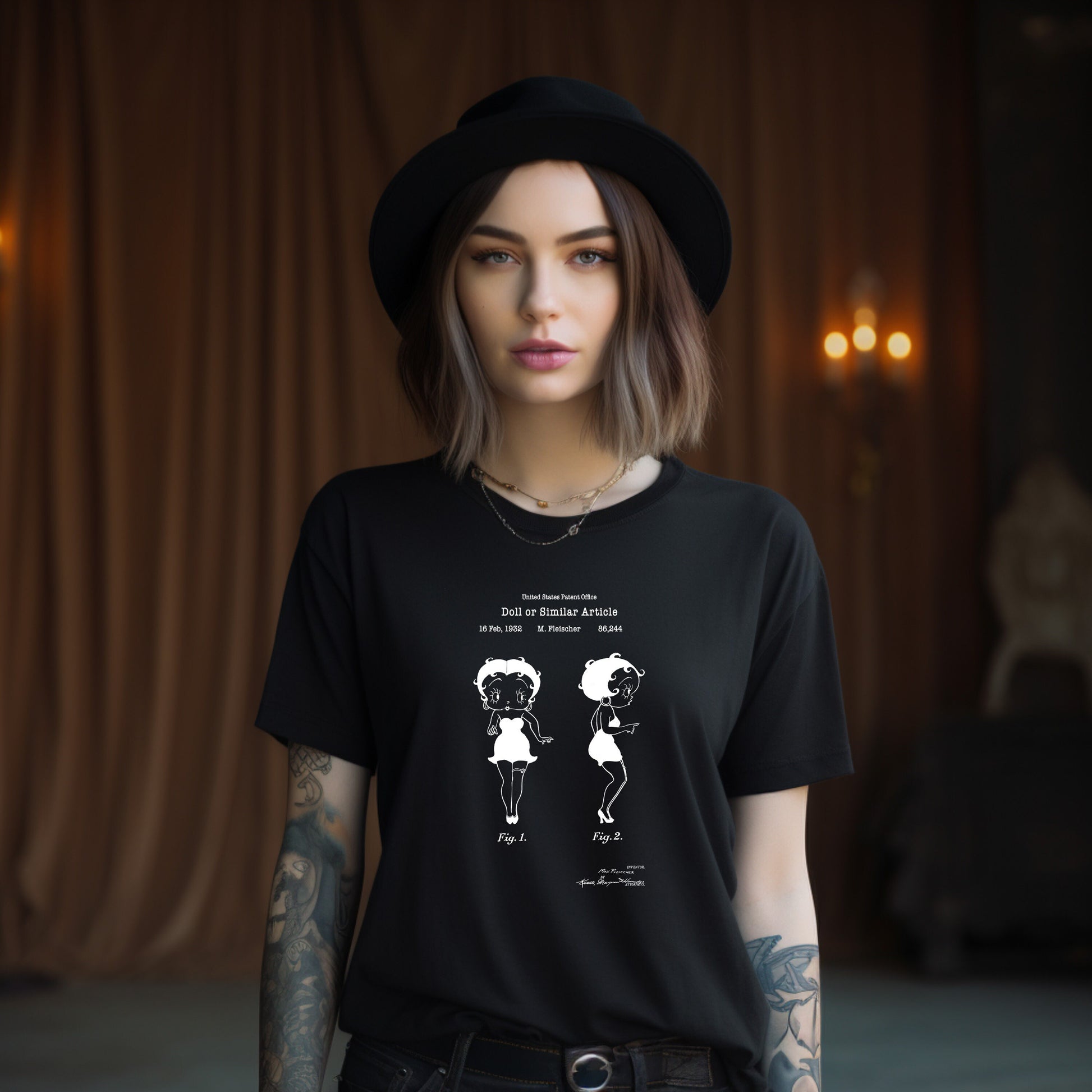 a woman wearing a black t - shirt with a drawing of a woman&#39;s