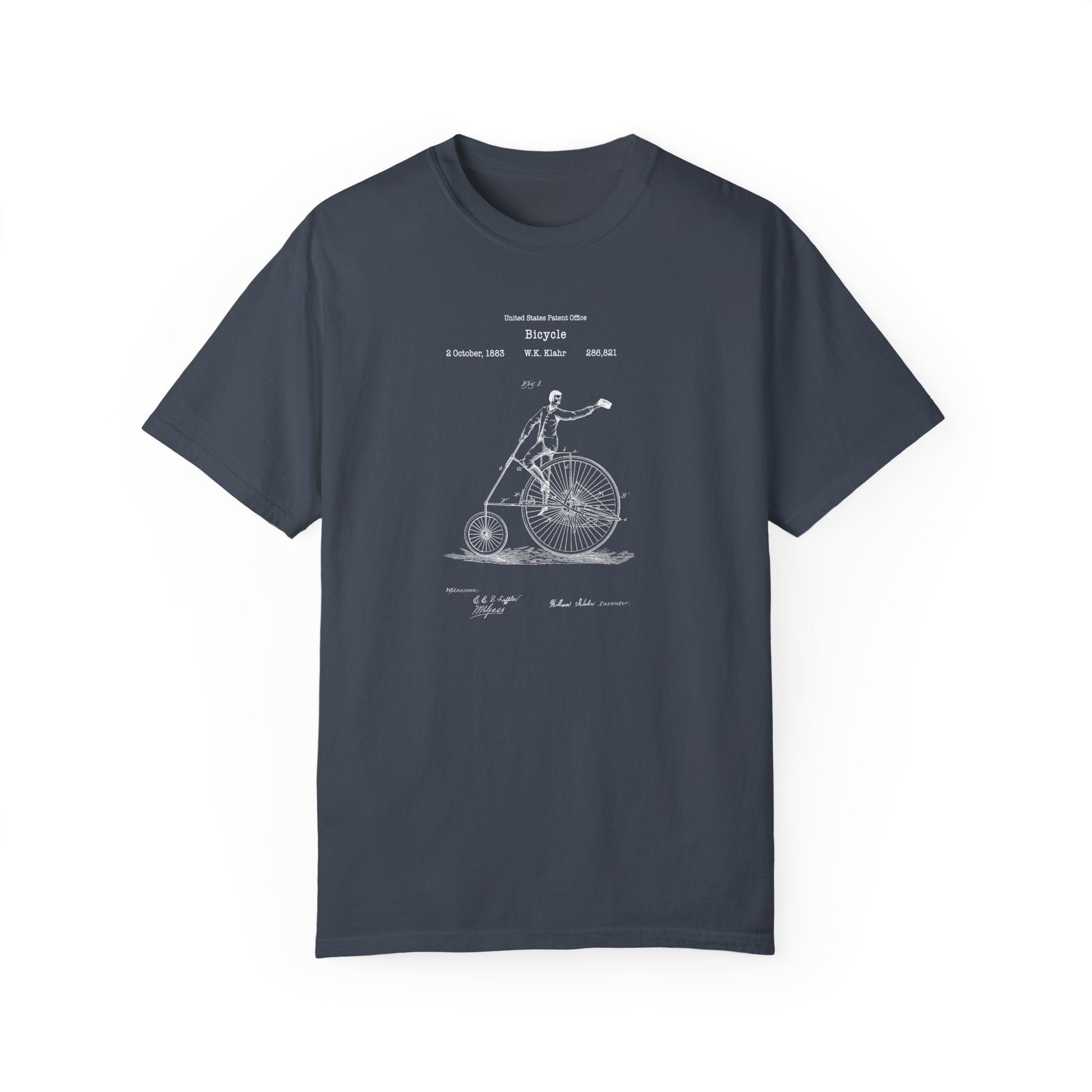 a t - shirt with a drawing of a man riding a bike