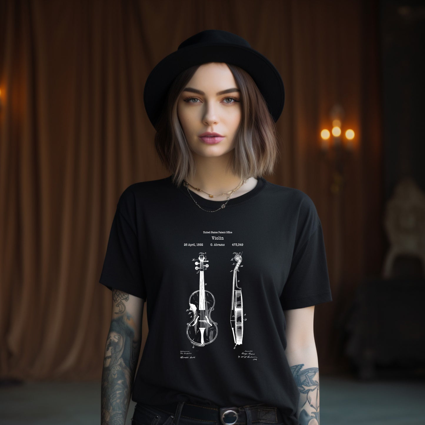 a woman wearing a black t - shirt with a drawing of a violin