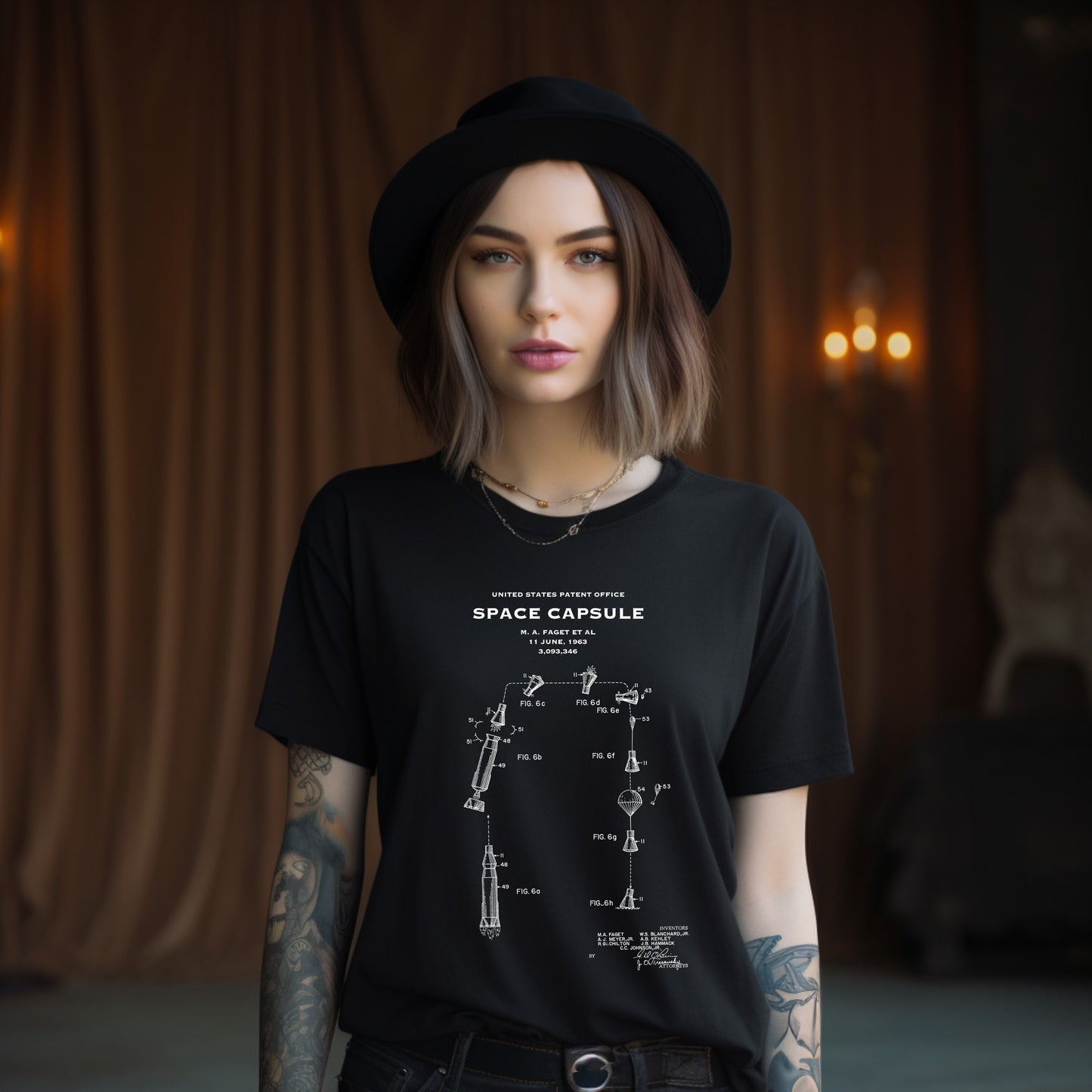 a woman wearing a black space capsule t - shirt